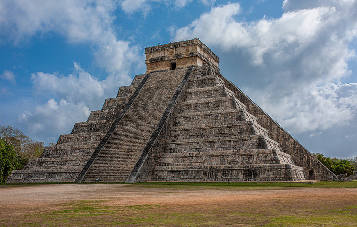The pyramid of Kukulcan in the Mexican city of Chichen Itza at amazing sunset - Yucatan, Mexico