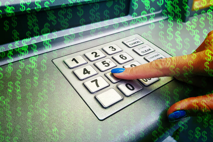 Woman hacker stealing sensitive data from credit card on ATM with abstract background         