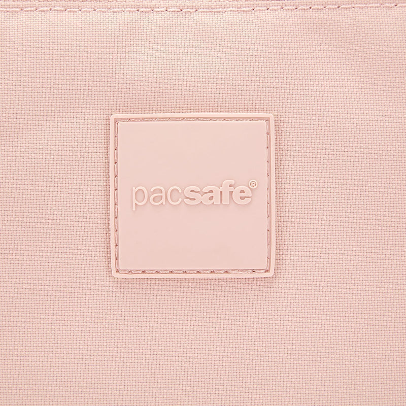 Pacsafe® GO anti-theft crossbody pouch, Sunset Pink